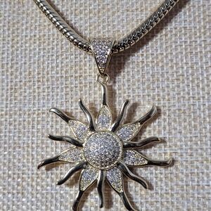 Necklace with radiant sun pendant in gold plated gold